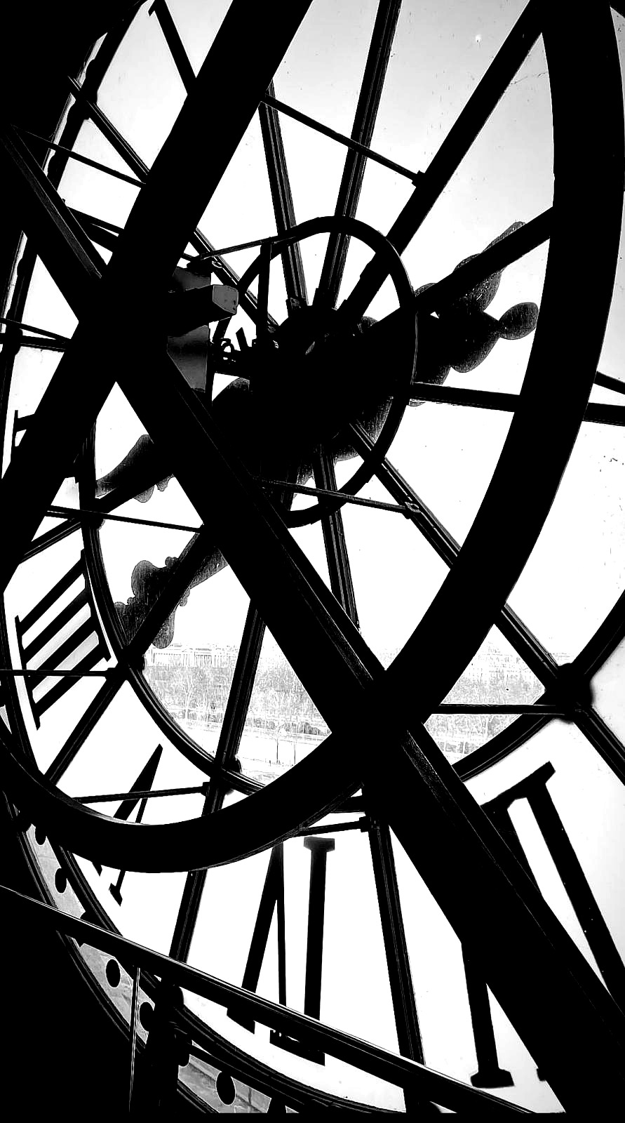 Clock face overlooking Paris, black and white