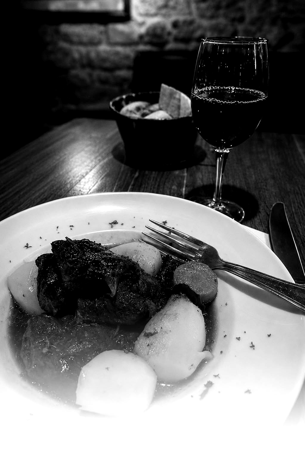 Solo dinner with wine, black and white