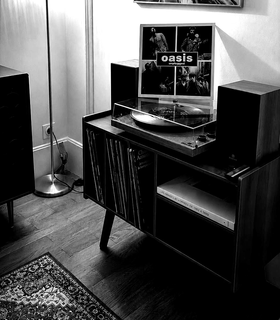 Turntable with an Oasis record, black and white